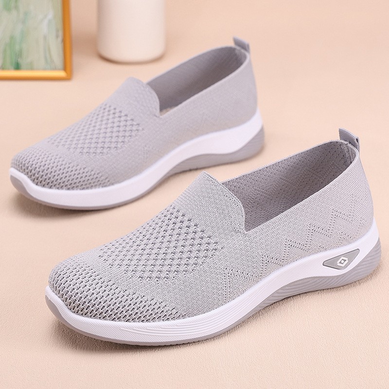 Zapatos de mujer zapatos grandes zapatos transfronterizos al por mayor zapatos casuales transpirables de color sólido zapatos planos versátiles