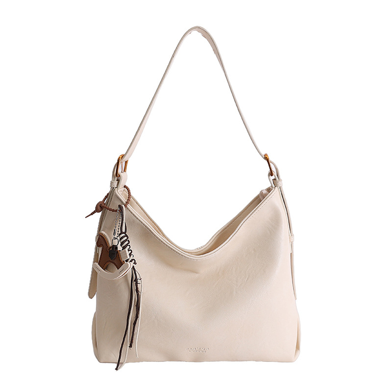 Alta sensación de gran capacidad de viaje bolsa de mano para mujeres Europa y América textura nicho de moda simple universal bolsa de hombro