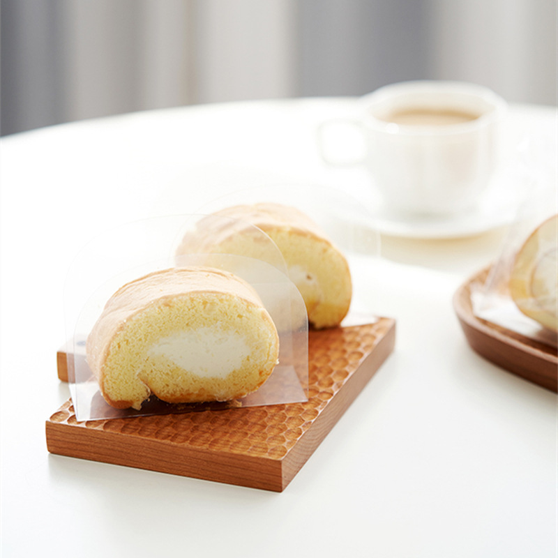 Transparent cake roll separator film Swiss roll slice packaging bag edge film Dragon roll base tray packing bag Mould
