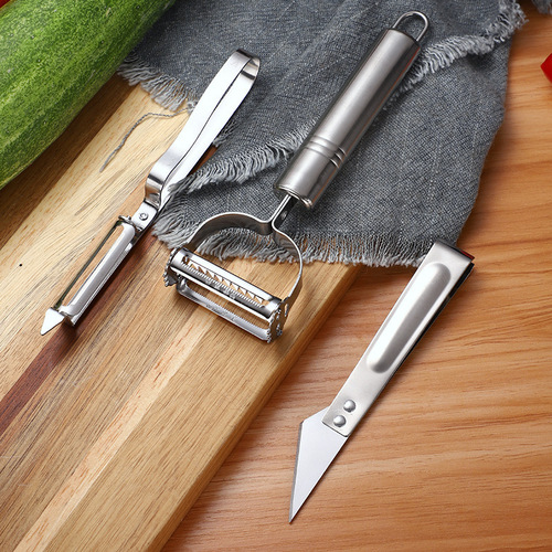 Three-piece set of stainless steel peelers for melon and fruit peeling, household melon and fruit peeling duck feather clip, double-headed peeling knife and grater