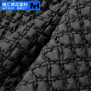 刺绣面料涤纶布春亚纺秋冬弹力夹棉化妆包棉服衍缝立体绣花布批发