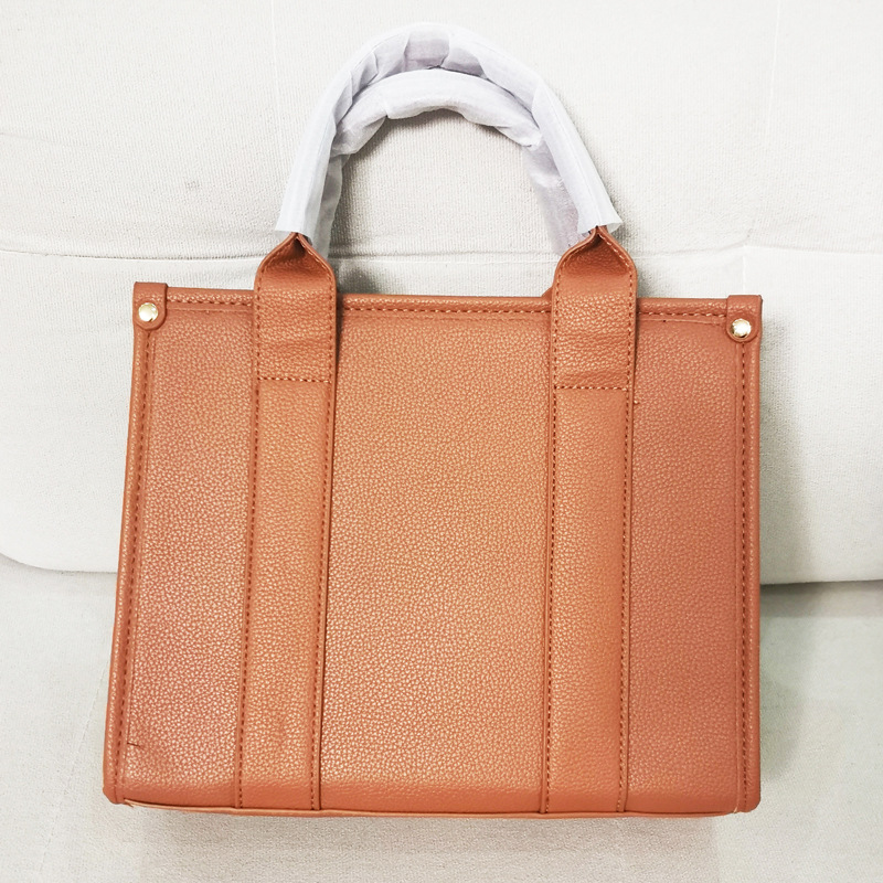 Bolso de mano para mujer Niche Bolso bandolera minimalista de estilo europeo Bolso mensajero de moda.