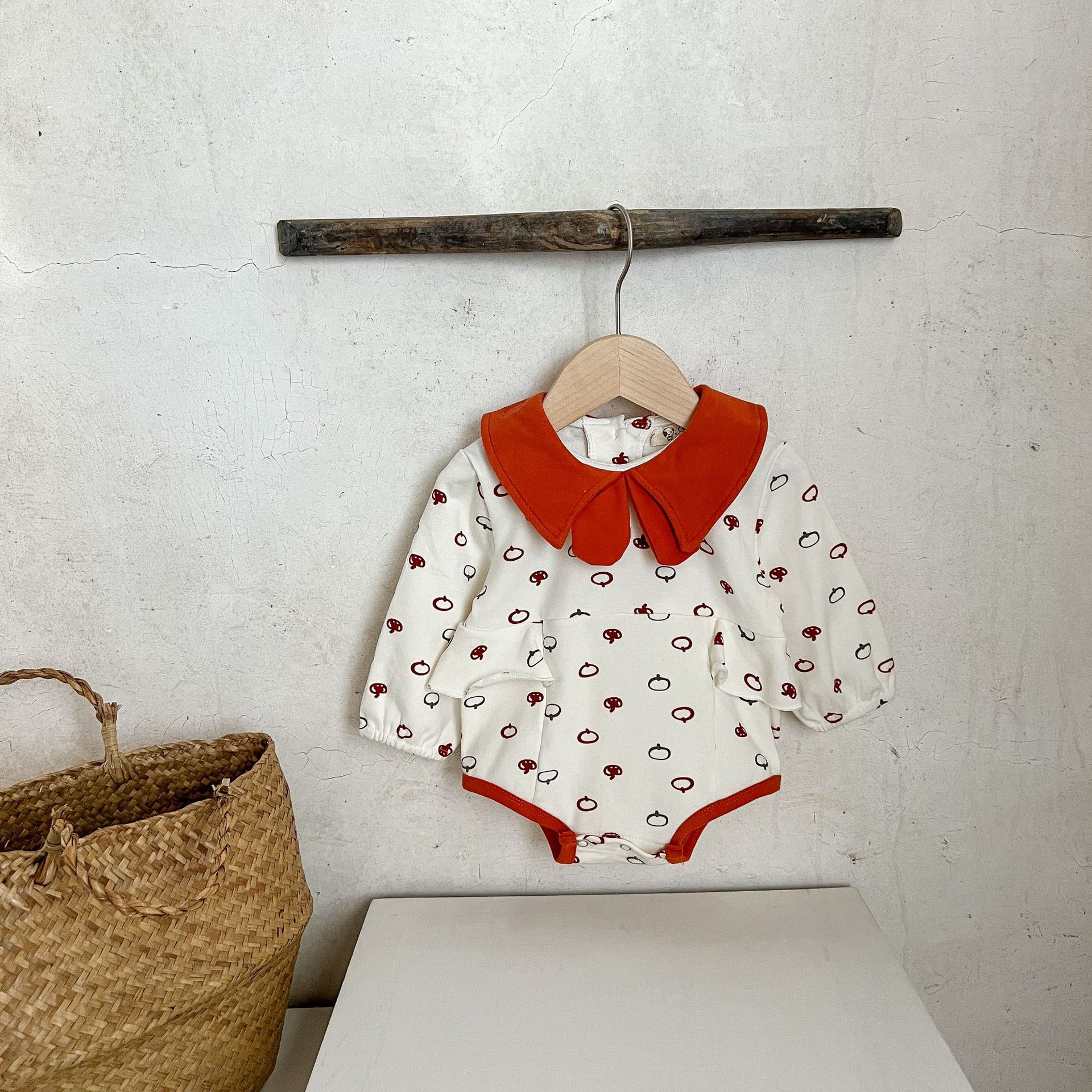 INS estilo coreano niñas calabaza impresión solapa color matching mameluco recién nacido versátil algodón casual mono