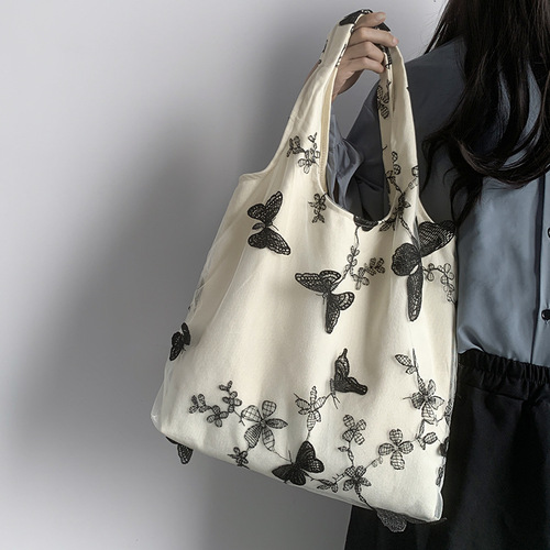 Super beautiful embroidered black butterfly canvas bag lace fairy casual travel women's bag literary large capacity versatile shoulder bag