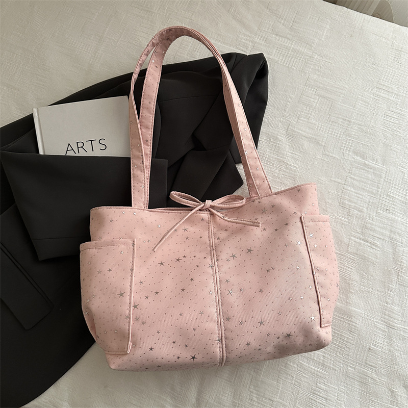 2026 nuevo estilo coreano de impresión de estrellas bolsos de mujer bolsos de gran capacidad de viaje bolsos de hombro de moda bolsos de brazo portátiles