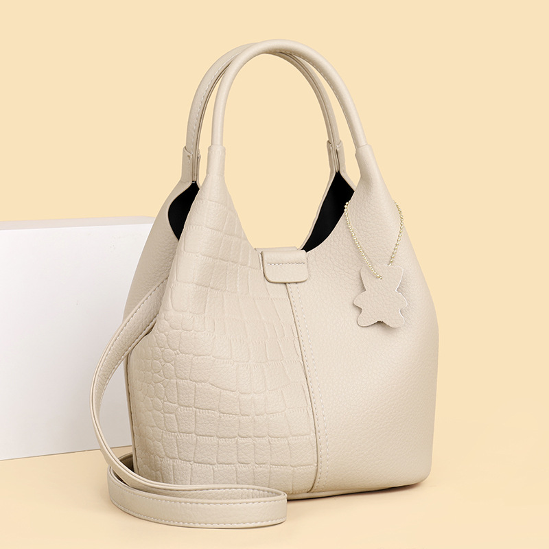 Moteriška didelės talpos rankinė 2024 m. Nauja korėjietiško stiliaus madinga motinos rankinė su minkšta odine pečių rankine su tekstu_voghion.com