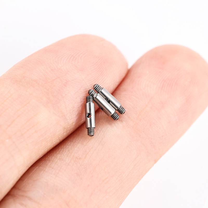 Silver pointed spike labret stud material detail