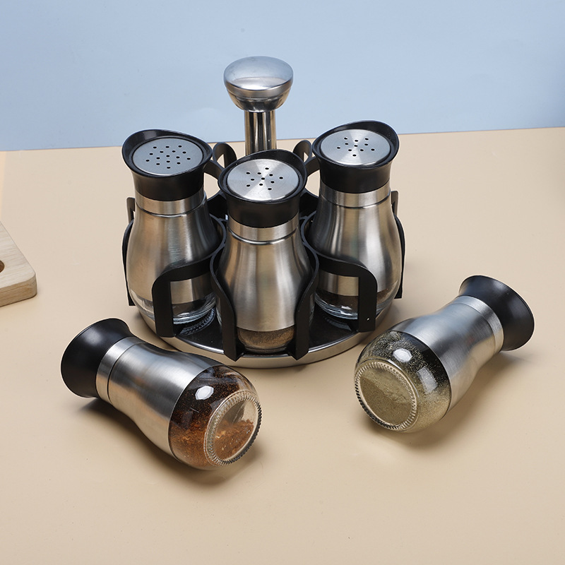 Venta al por mayor de acero inoxidable cocina condimento botella sellada tarro hogar condimento botella combinación traje comino pimienta tarro