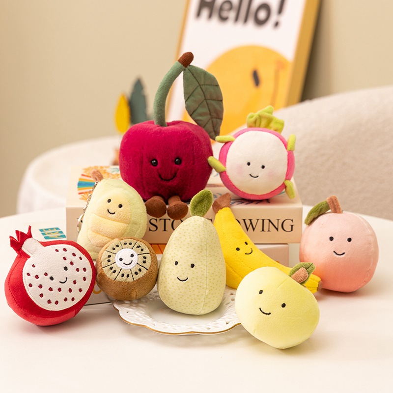 Fruitas interesantes melocotones bananas granada fruta de fuego juguetes de peluche bolsas de muñecas colgantes cereza muñeca agarrar muñeca máquina