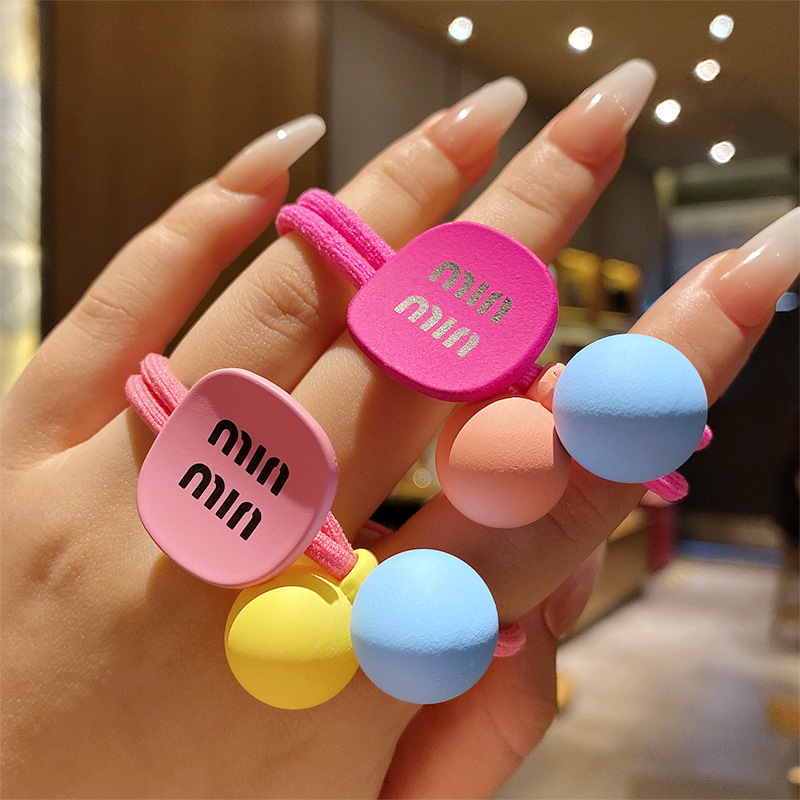 Coreano simple letra MIN anillo de cabello de niña bola cabeza cuerda de cola de caballo universal toque de cabello correa de cuero al por mayor