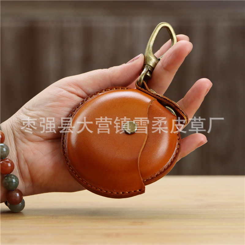 クリエイティブな一層牛革製ハンドメイド小銭入れ、イヤホンケーブル収納バッグ、丸型バッグ、ペンダント、小物入れ、レトロ収納バッグ