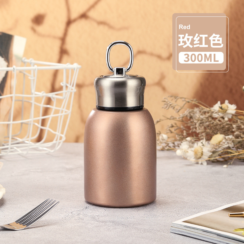 Taza termo de moda nacional de estilo caliente, taza termo de mano portátil al aire libre de moda para el hogar, taza de agua para estudiantes, taza termo para automóvil