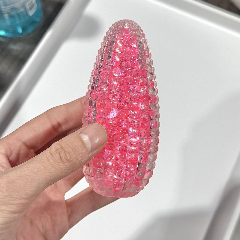 瑠璃水晶のトウモロコシのつまみの音楽はボールのトウモロコシの可塑性のスプリングバックのつまみの音楽の減圧のおもちゃをつぶして砂を流します。|undefined