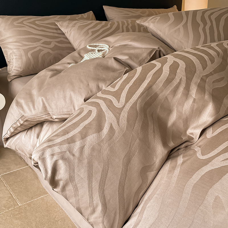 Cama de algodón de cuatro piezas 2025 nuevo estilo satén de lujo ligero algodón funda edredón sábana ropa de cama de tres piezas ropa de cama