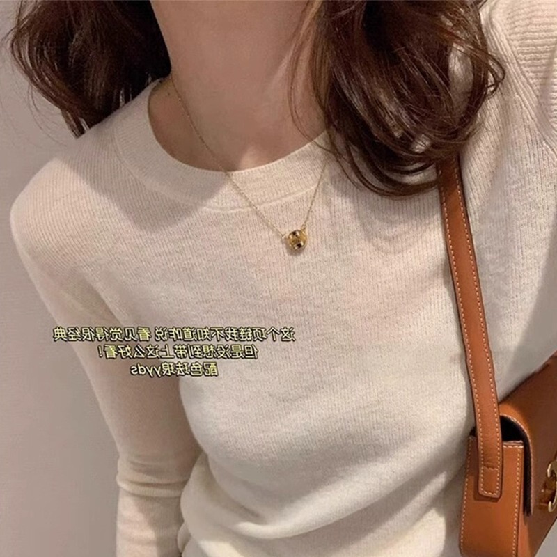 国境を越えて韓国版の秋冬の中で保温して身を修めてやせている気質の長袖のtシャツのニットの女性の上着を現します。|undefined