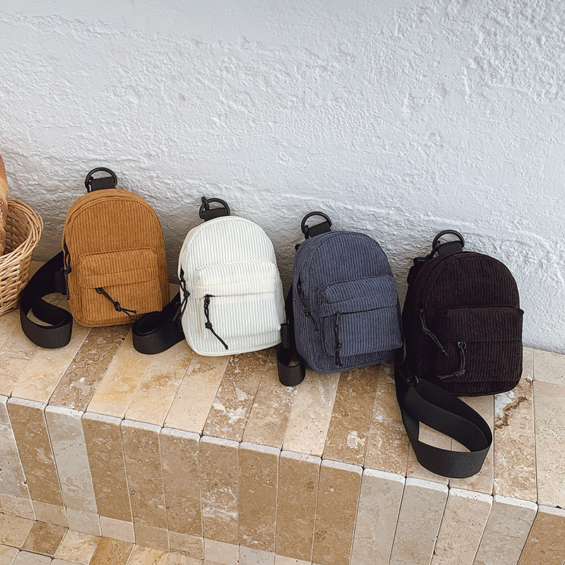 Otoño y invierno nuevo tipo de tela de seda para niños bolsa de pecho deportiva de ocio de viaje ligero bolso de cintura para niños de color sólido coreano bolso de cintura