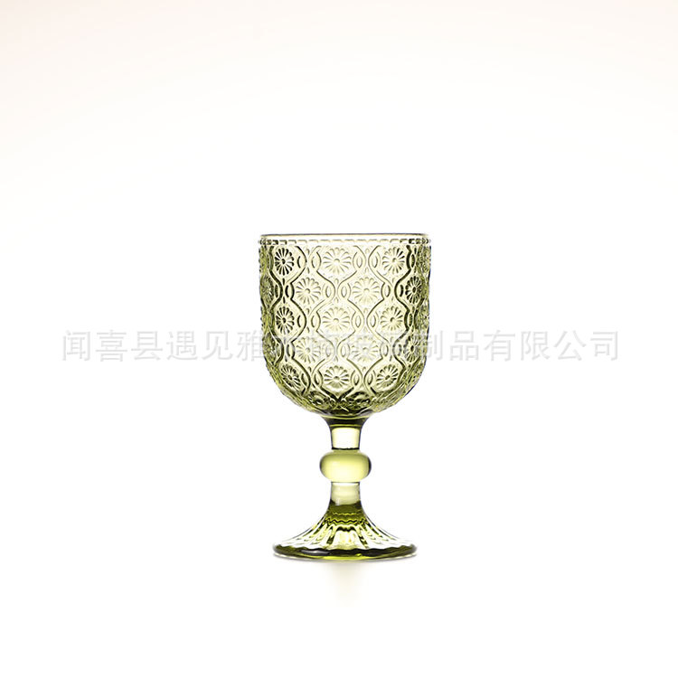 Taza de vino de vidrio en relieve Taza de vino de comercio exterior Europa Taza de decoración al por mayor Taza de jugo Taza de vino de pie alto