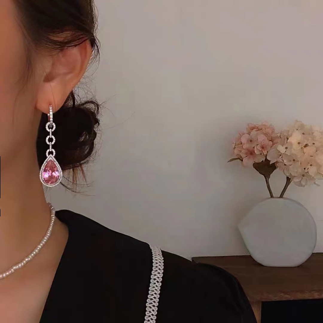 Elegant earrings with zircon drop-shaped