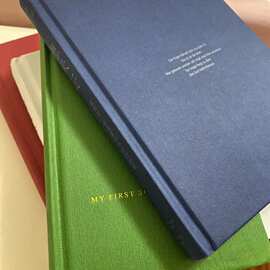 跨境书籍定制圆脊精装书印刷金边硬壳裱布书锁线画册宣传海报印刷