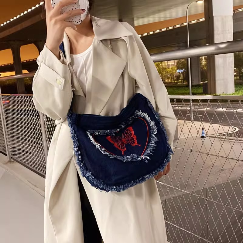 伊妮兒 日系牛仔包做舊帆布包女愛心蝴蝶包百搭ins學生單肩斜挎包