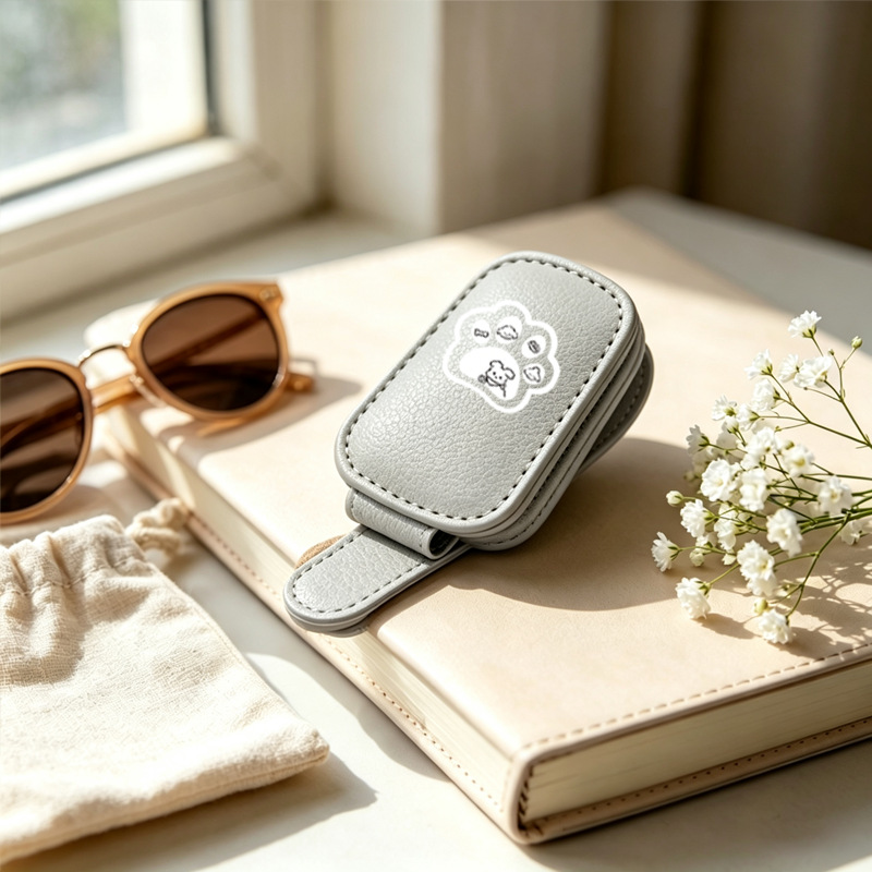 Gray cross-border bestseller sunglasses holder, creative car sun visor storage, paw print puppy car glasses clip