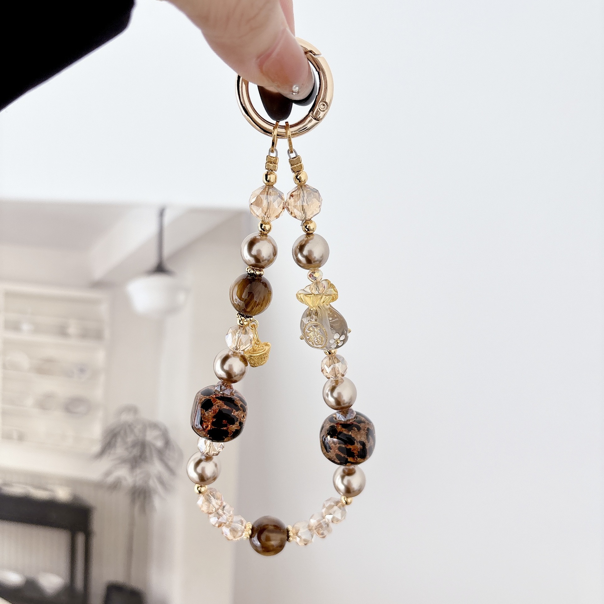 La sensación de alto nivel de lujo ligero bolso Fuyuan Bao cadena de teléfono móvil cadena de teléfono móvil bolso llavero colgante nicho diseño