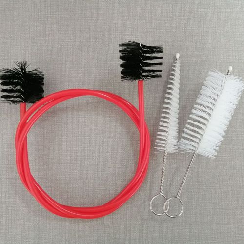 Trombone cleaning brush set, including a tenor trombone mouthpiece brush, suitable for tenor trombones, mouthpieces, and other wind instruments.