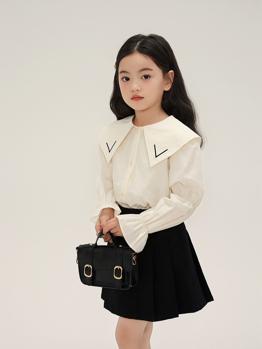 Estilo coreano dulce estilo solapa puff manga camisa de las niñas 2024 primavera nuevos niños todo-fósforo color sólido bebé camisa
