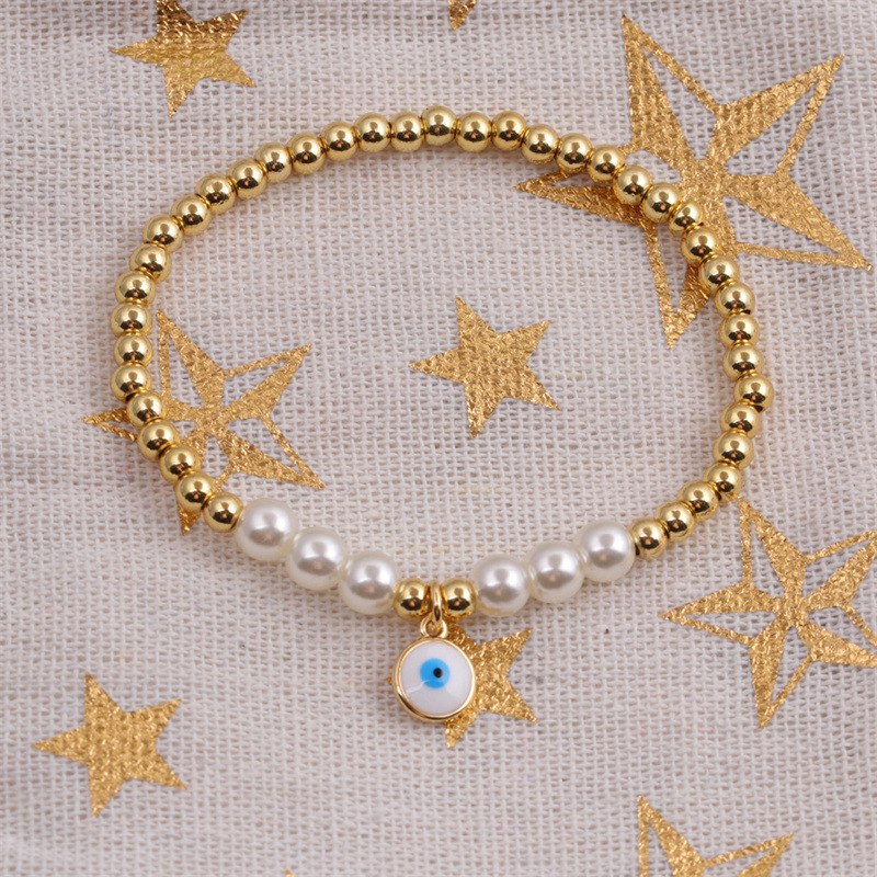 Korean copper-plated real gold dripping oil devilu0027s eye beads bracelet wholesale Nihaojewelry