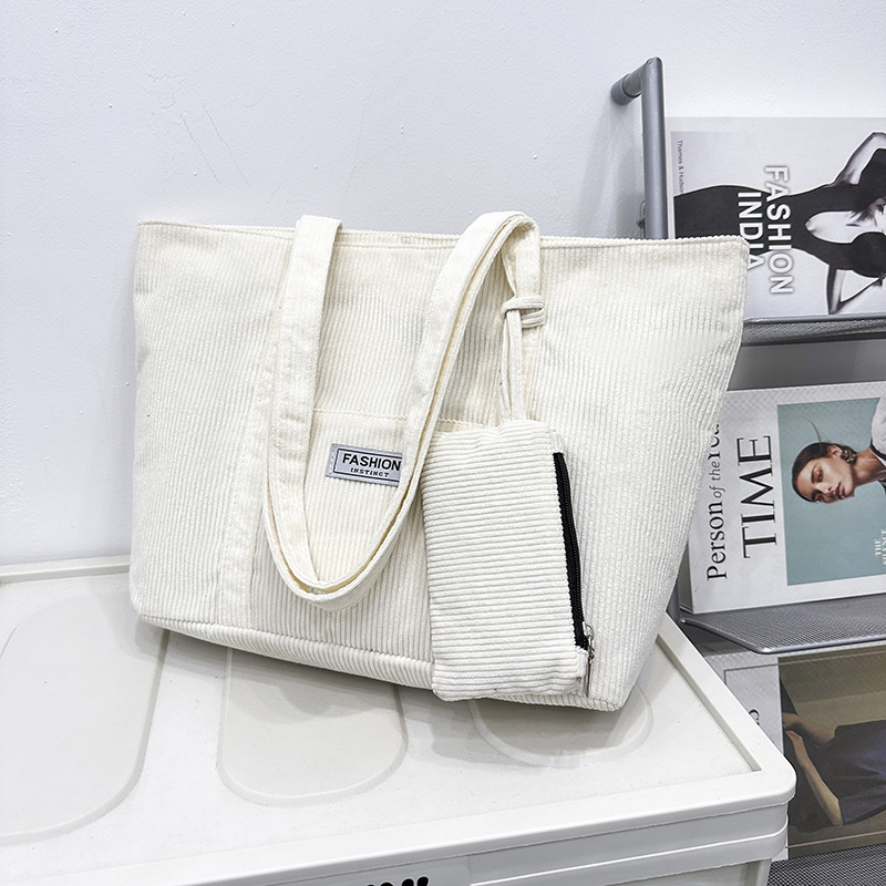 2025 otoño e invierno nueva moda bolso de hombro de pana de gran capacidad bolso de mano fresco estilo japonés bolso grande de pana de color puro para mujer