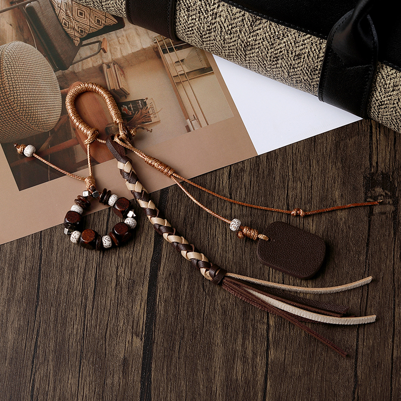 Authentic Leather Bag Pendant with Natural Bodhi Seed Accessories, Light Luxury Niche High-End Ornament Authentic Leather Bag Pendant with Natural Bodhi Seed Accessories, Light Luxury Niche High-End Ornament