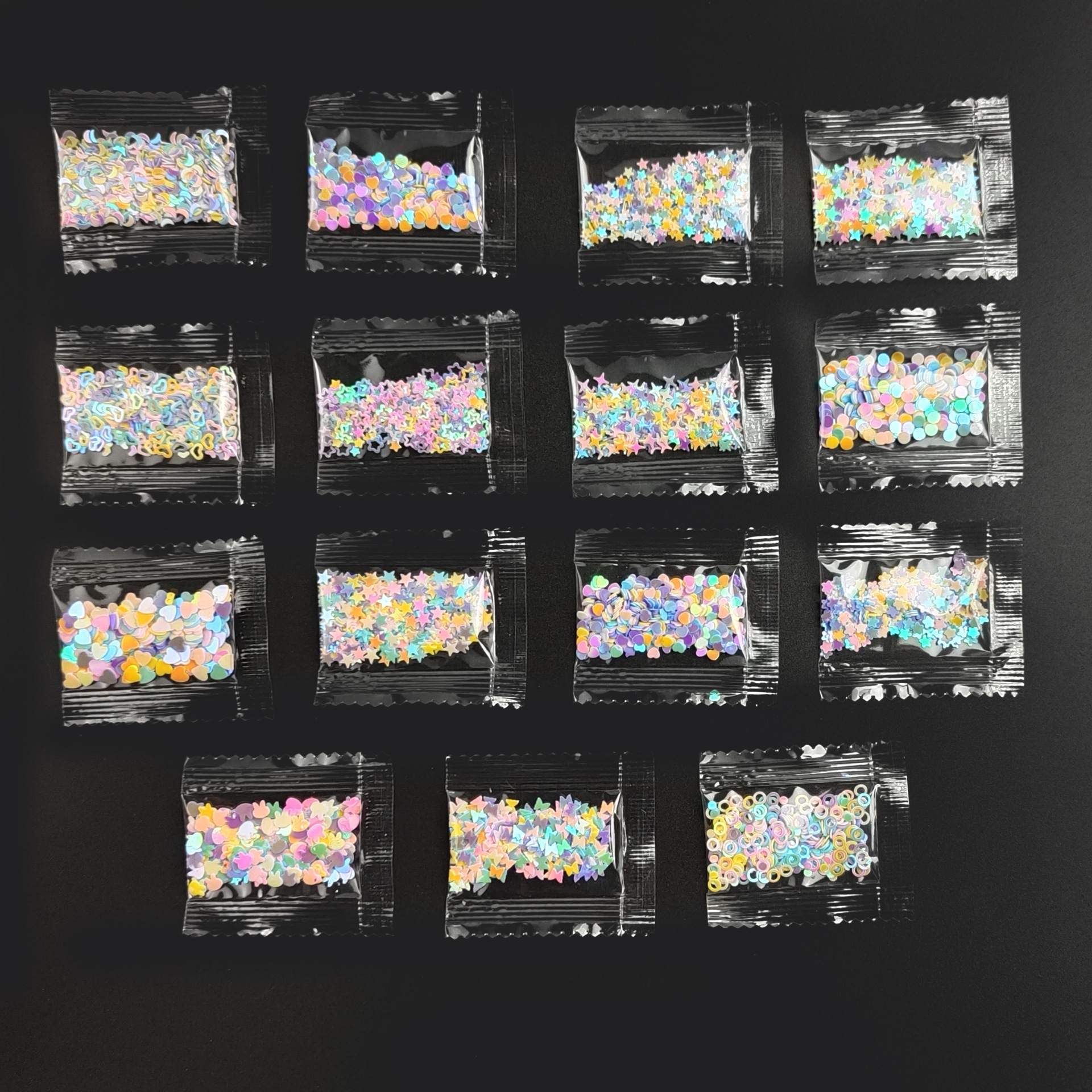 Factory sales 1g pack star-shaped multi-color glitter candy small bag stress relief double-sided adhesive bubble squeeze play toy decoration