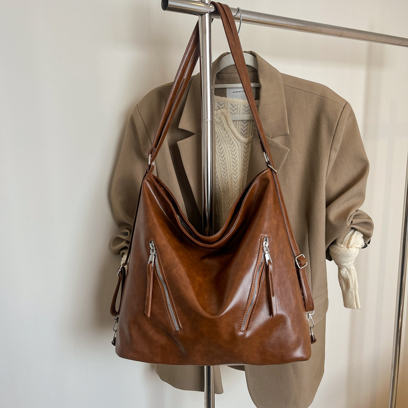 Invierno nueva mochila de gran capacidad de textura sólida coreana 2024 mochila de viaje a la moda de mochila de trabajo