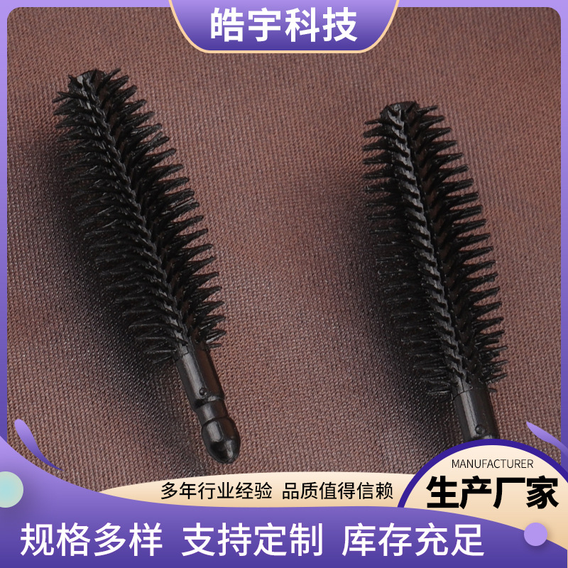 The manufacturer supplies disposable olive-shaped eyelash brush…