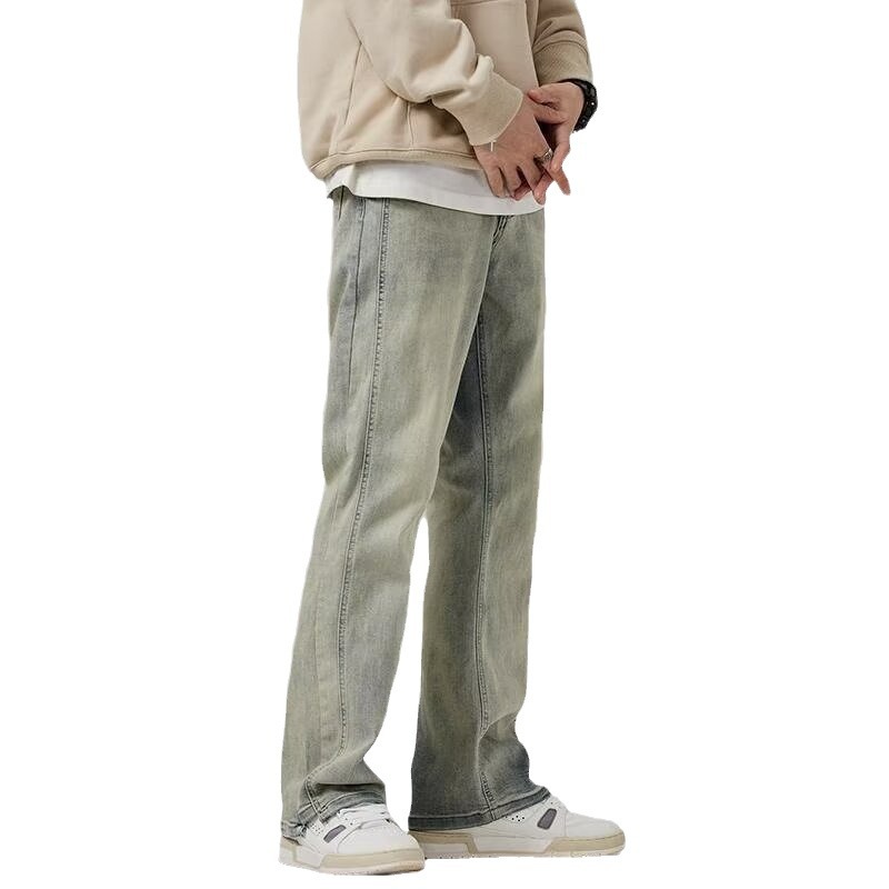 Vaqueros teñidos de barro amarillo de marca de moda retro para hombres lavados y viejos pantalones micro-lat de calle alta americana 2024