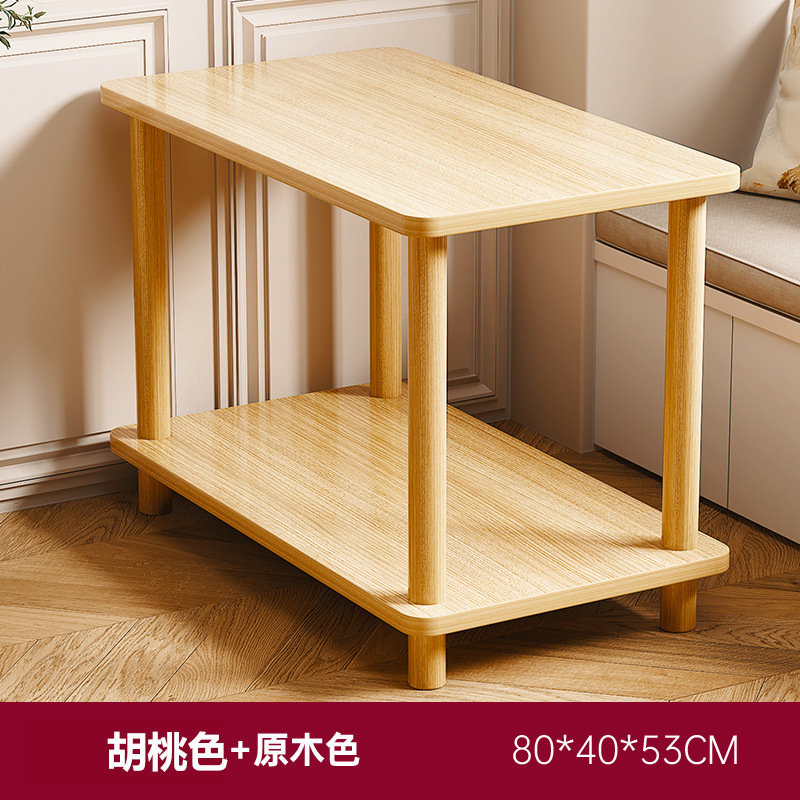 小さいテーブルのソファーの辺のいくつかのお茶のいくつかの家庭は移動することができます。|undefined