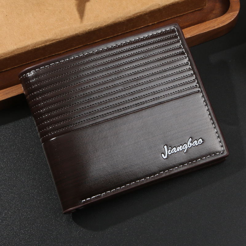 Fábrica directa para hombres 2025 nueva billetera retro impresión corta Amazon transfronteriza ultra ligera bolso portátil