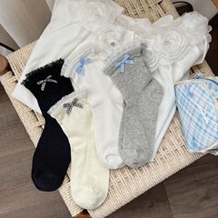 夏の新しい薄い格子の蝶結びのレースの純色の靴下の子供の中で筒の靴下のinsの潮の日系の靴下の網の目