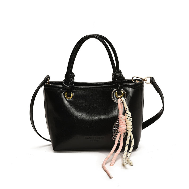 Bolso de mano popular, bolso de mano para mujeres 2025, nuevo bolso de cuero de cera de aceite retro, bolso de moda de textura versátil, mochila.