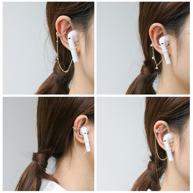 KJ cobre con incrustaciones de circonio auricular cadena anti-perdida clip de oreja hembra transfronteriza pendientes de moda de gama alta de seis puntas estrella auricular anti-perdida pendientes