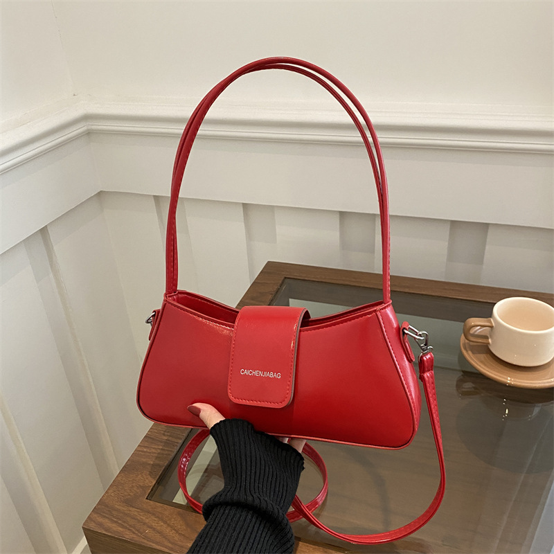 Bolsa de brazo de nicho francés para mujeres 2024 nueva moda bolso de hombro de estilo extranjero buckle bolso de viaje casual