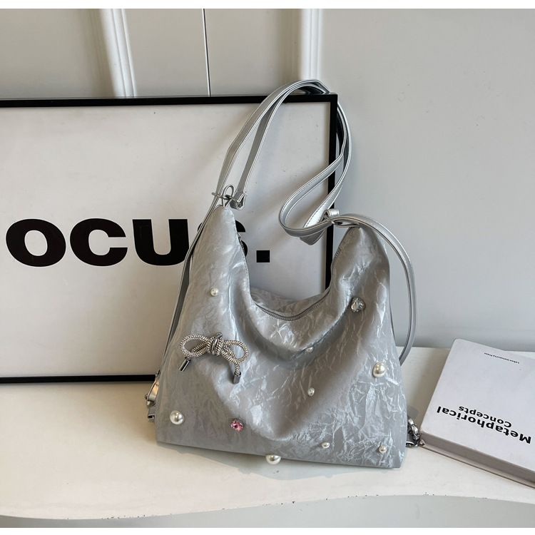 Bolsa de gran capacidad para mujeres 2024 nuevo nicho de alto nivel de diseño de diamantes de viaje multifuncional mochila de doble hombro inclinada