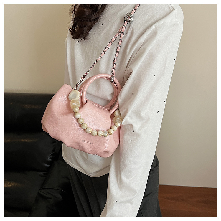 A stylish and trendy beaded bag for women, a new summer chain crossbody cloud bag for women in 2025 undefined