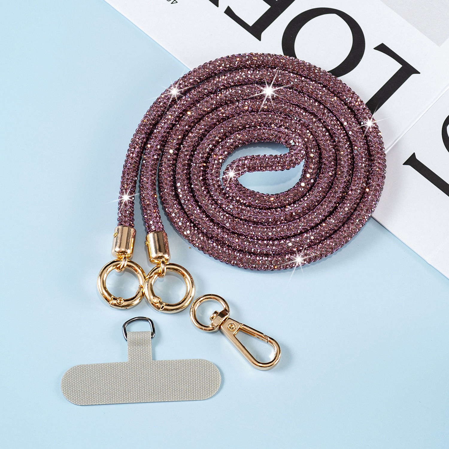 Luxury and high-end rhinestone phone charm, long crossbody phone strap, outdoor shoulder strap, anti-loss rope, fashionable pendant.