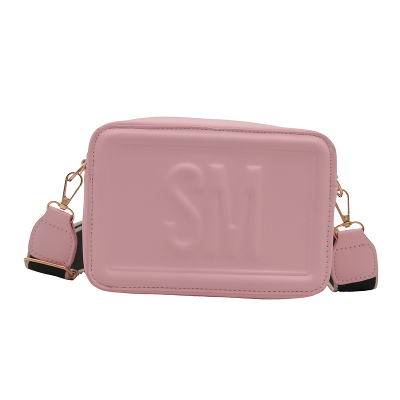 El estilo extranjero simple letras anchas cinturones de hombro mochila de hombro 2025 primavera nuevo color en bolsas casuales bolsas pequeñas