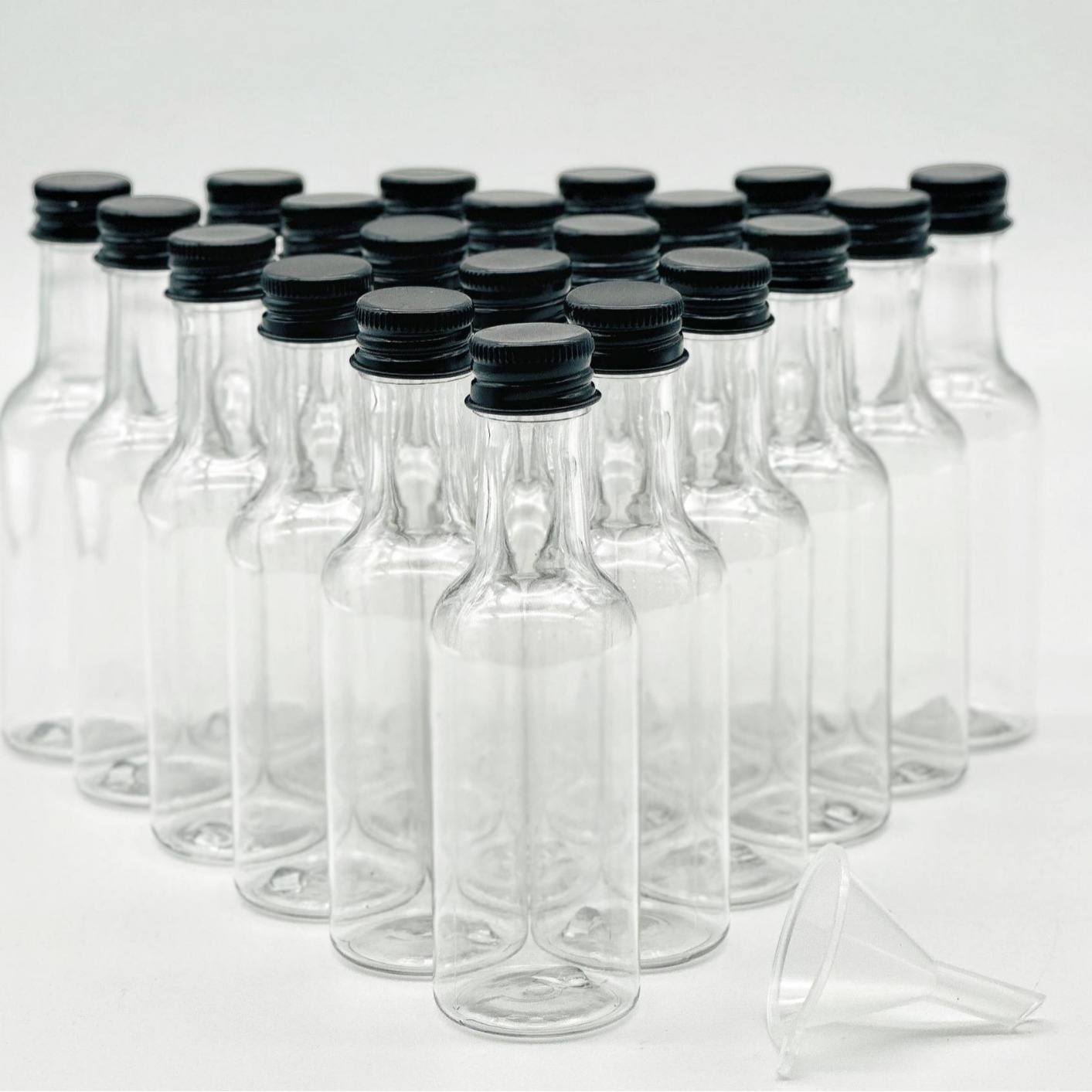 Fábrica en stock alta permeabilidad PET50ml pequeña botella de vino fruta vino bebida cubierta de aluminio botella de plástico multi-Capacidad gran cantidad Congyu