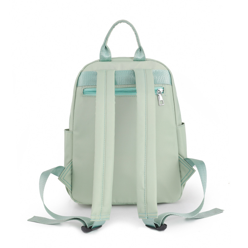 2023 nueva mochila de nailon casual para mujer, moda, literatura simple, viajes al aire libre, mochila pequeña, mochila escolar al por mayor