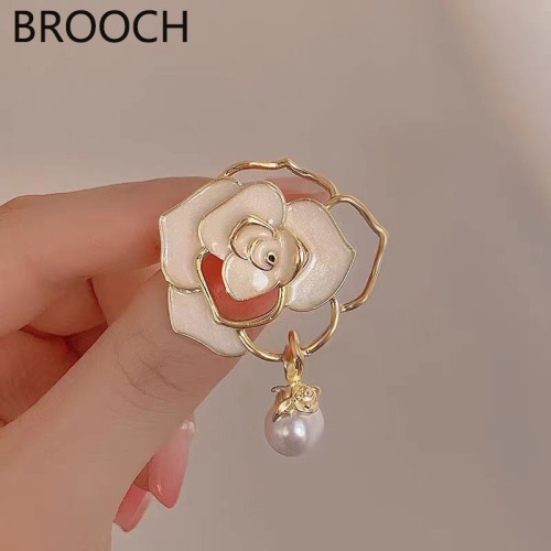 Exquisite fine glitter oil camellia brooch high-end pearl corsage brooch Korean style anti-exposure clothing accessories wholesale