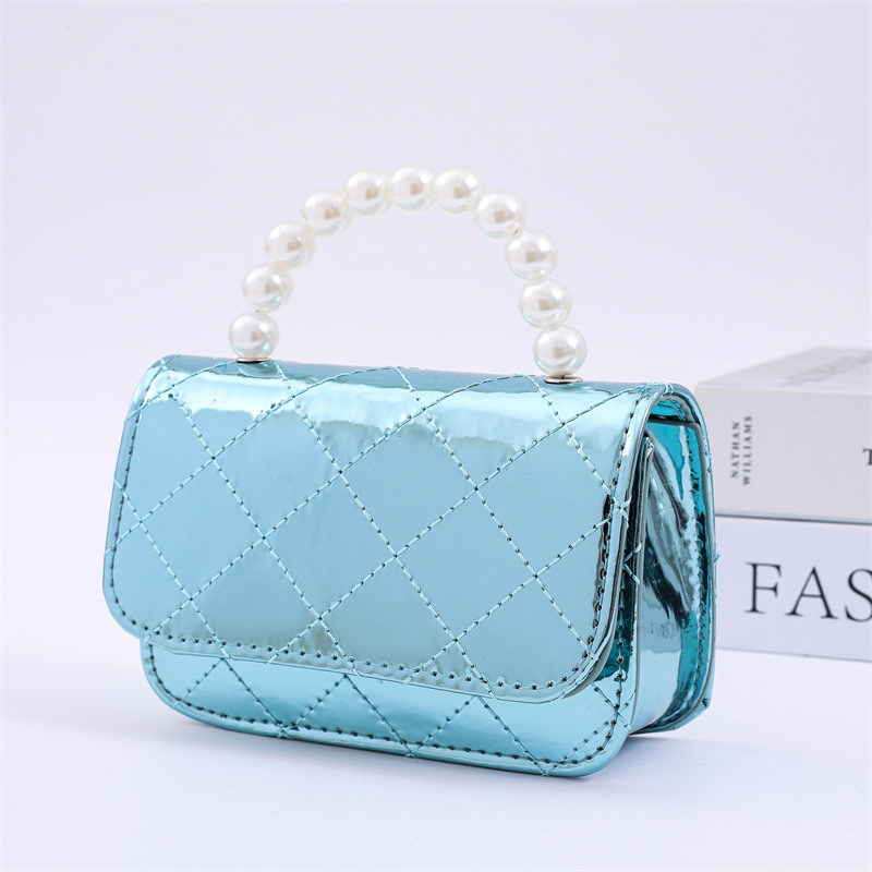 2025 primavera y verano estilo caliente moda casual niños dulces bolsa de gelatina mini bolso de mensajero de un solo hombro variedad al por mayor