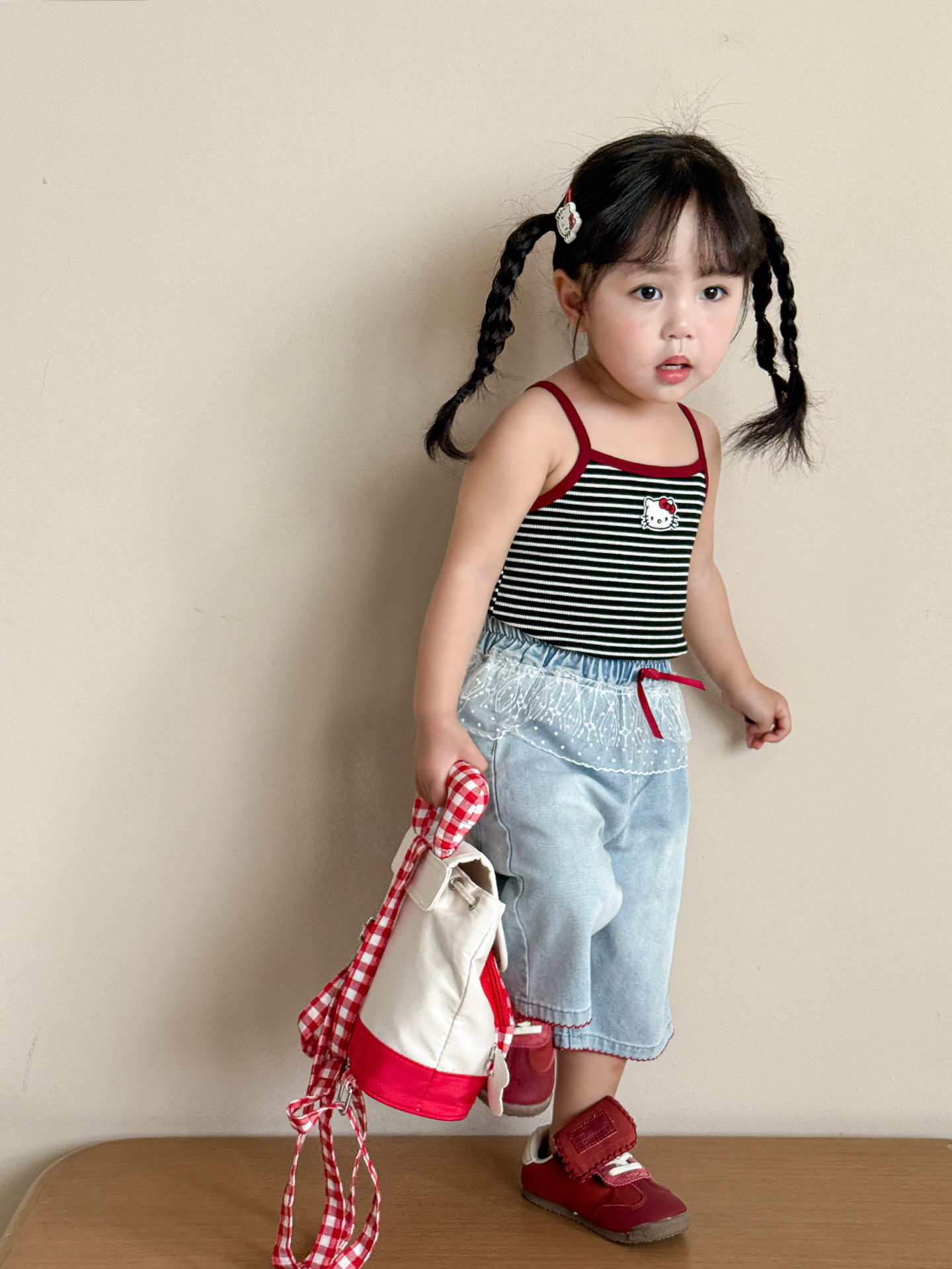 Caña de pera ropa para niños camisola para niñas estilo fino de verano 2025 nuevos tops a rayas de dibujos animados para niños ropa de bebé para niñas